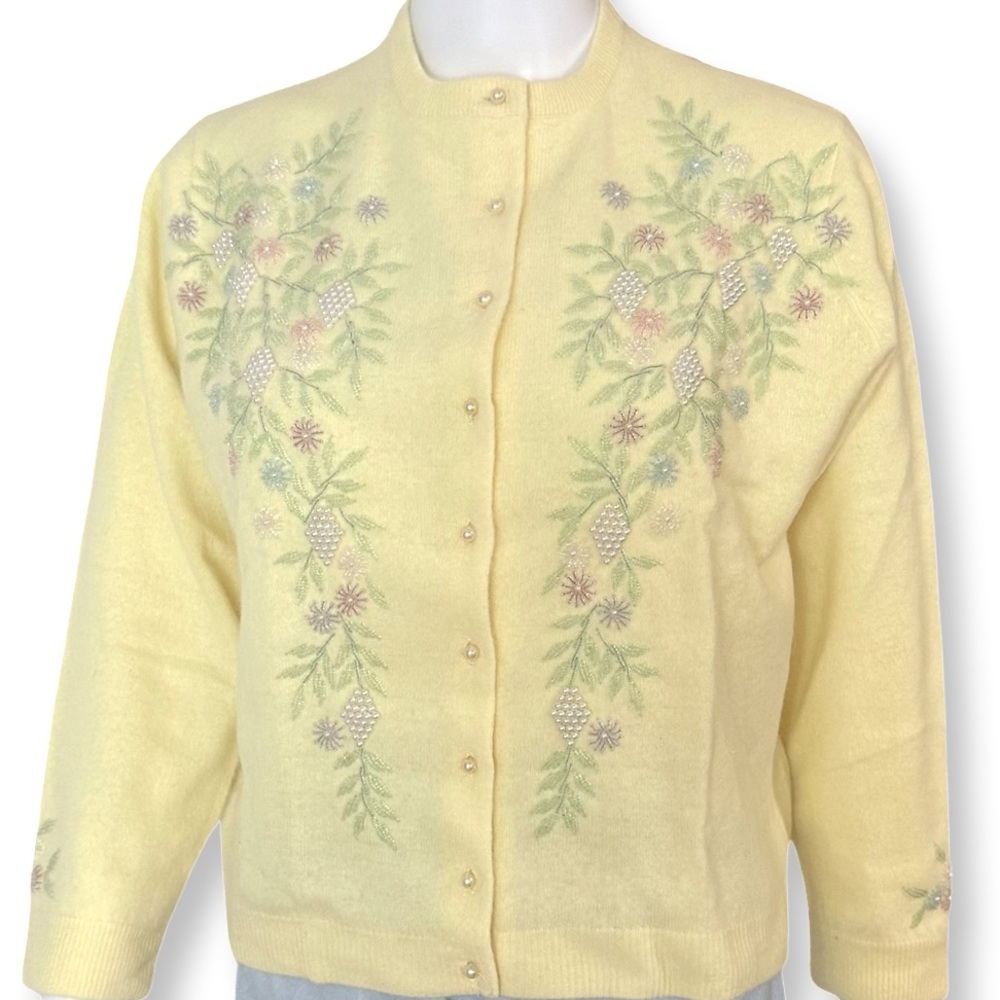 1960s deadstock cardigan sweater with original tags.